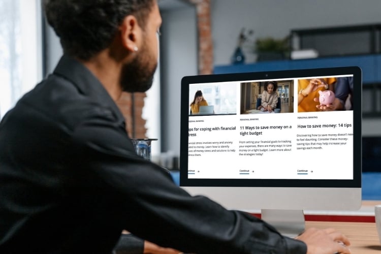 Man browsing credit union website